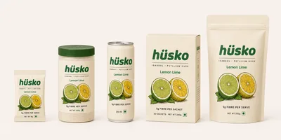 The hüsko range: an 8 g sachet, a 200 g jar, a 250 ml can, a 30-sachet carton and a 250 g refill pouch